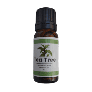 Bottle of tea tree essential oil, with flowers on the label